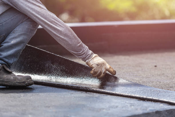 Professional Basement Waterproofing technician working in Ridgeway, VA